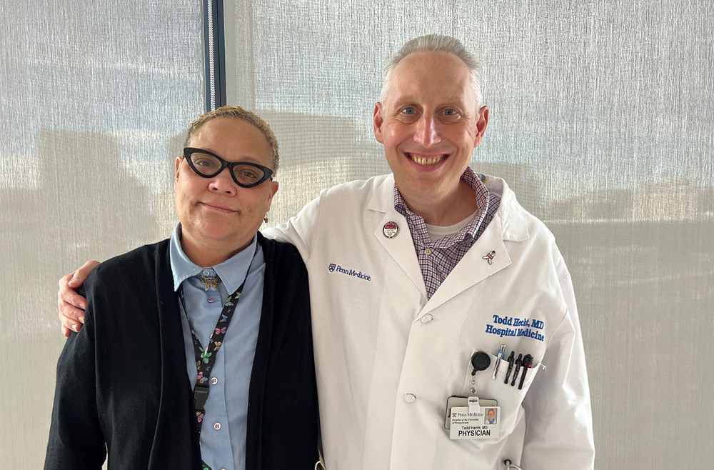 HUP unit secretary Veronica Elena, at right, with Todd Hecht, MD